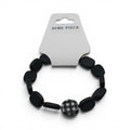 CCBeadsandBeyondLLC black beaded bracelet with a checkered charm. Features oval and round beads.