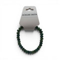 CCBeadsandBeyondLLC green beaded stretch bracelet with varying shades of green beads.
