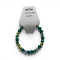 CCBeadsandBeyondLLC green pearl beaded bracelet with mixed finishes and shades of green and silver.