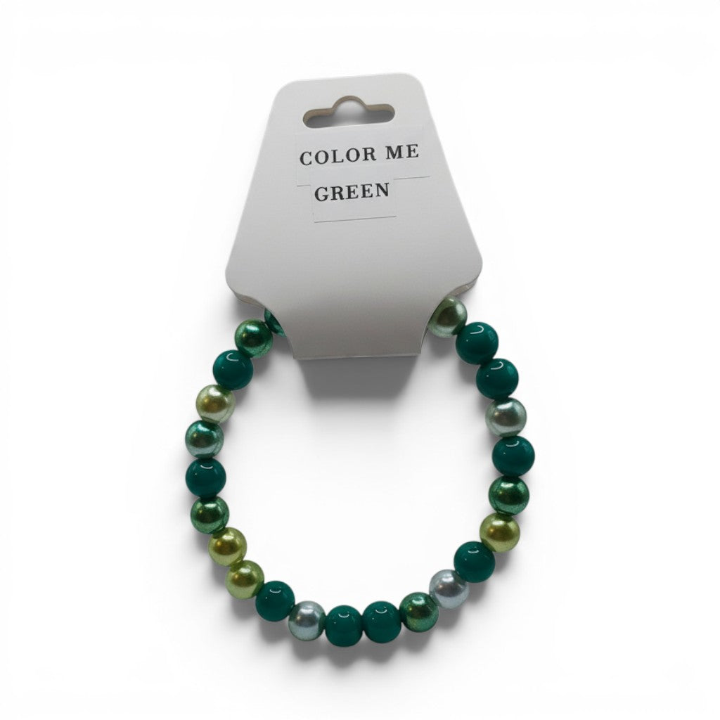 CCBeadsandBeyondLLC green pearl beaded bracelet with mixed finishes and shades of green and silver.