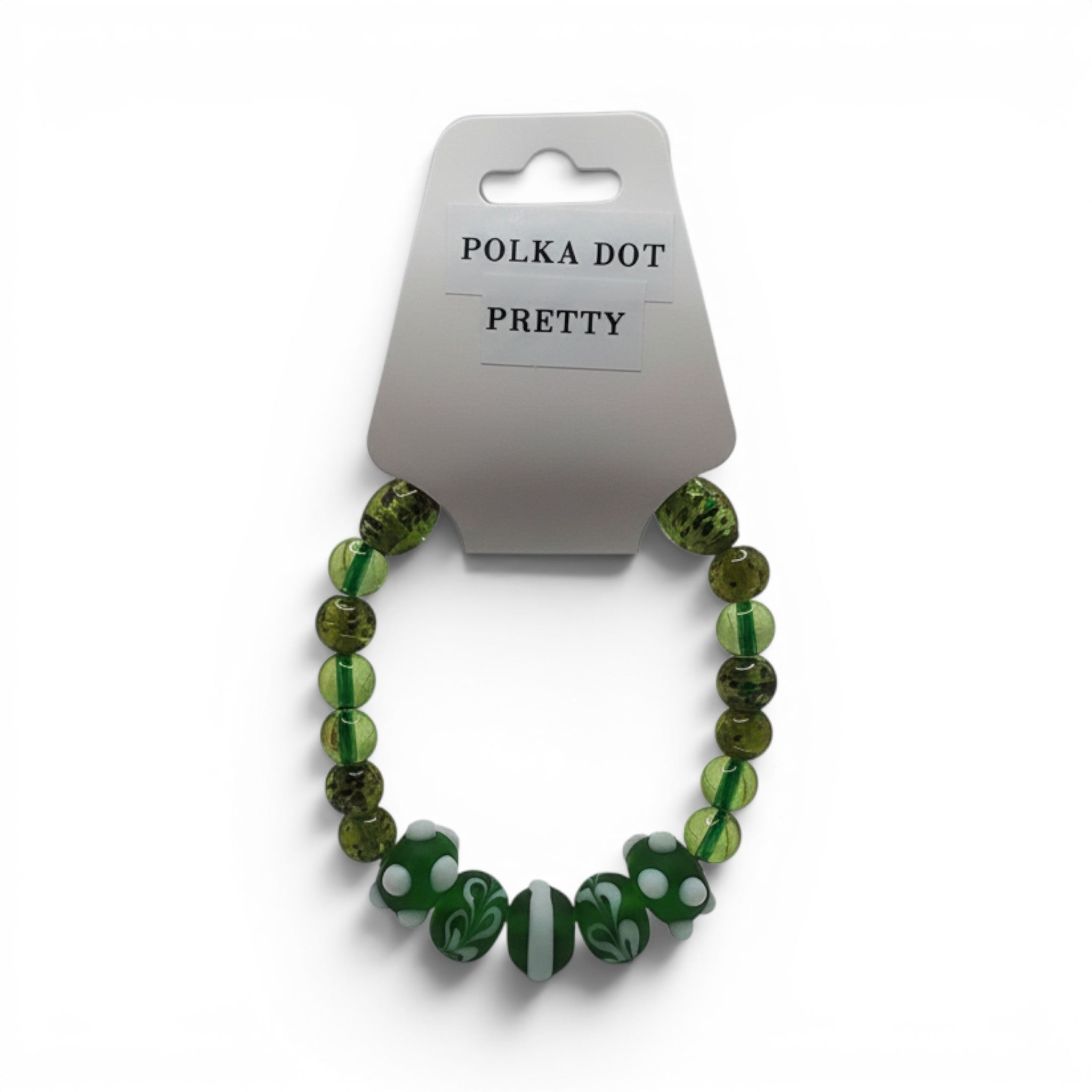 CCBeadsandBeyondLLC green and white polka dot glass bead bracelet with swirl accents
