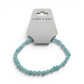 CCBeadsandBeyondLLC Light N Airy bracelet with light blue and white beads.