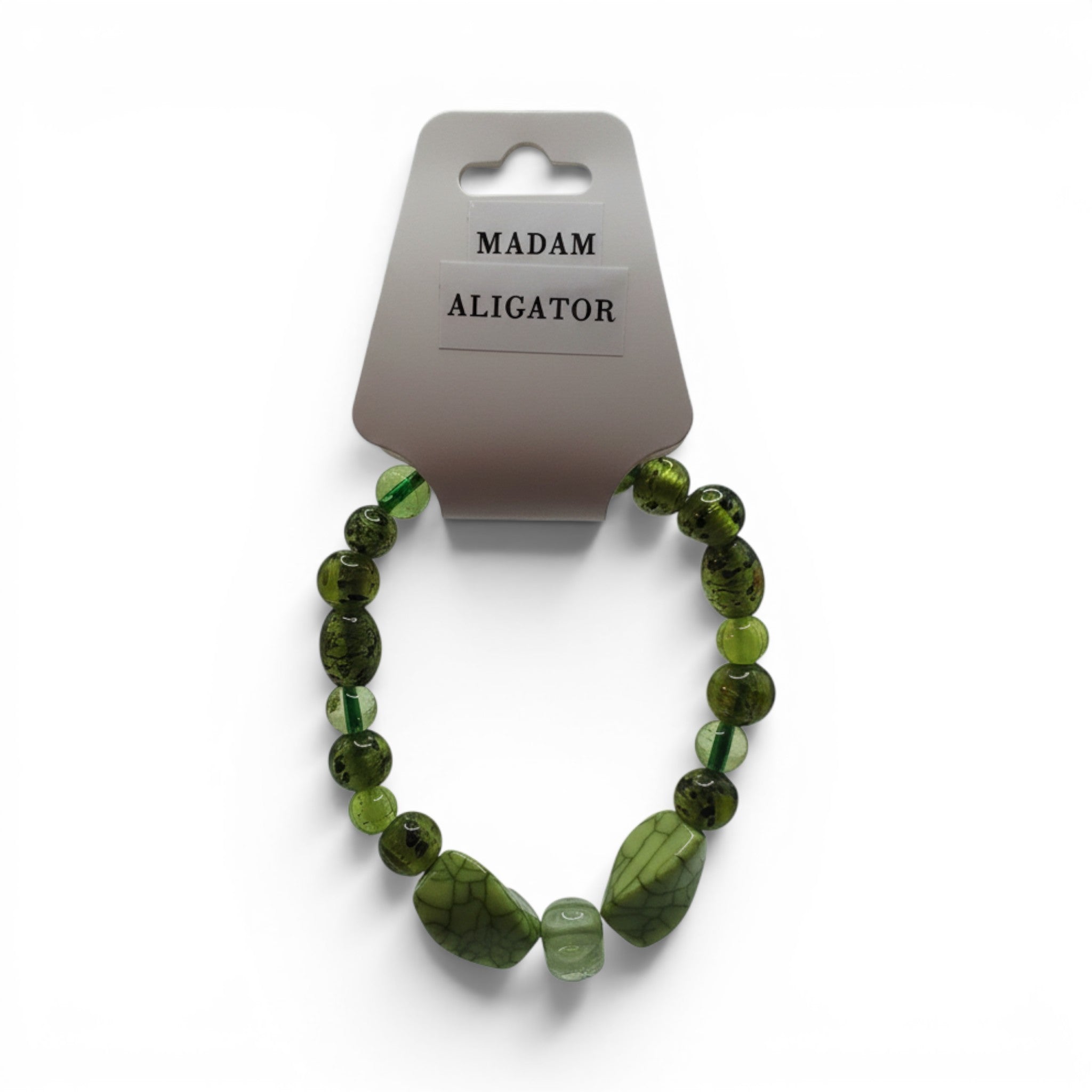 CCBeadsandBeyondLLC Madam Aligator bracelet with green alligator-shaped beads and round green glass beads.