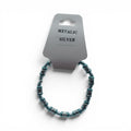 CCBeadsandBeyondLLC metallic silver beaded bracelet with teal and silver barrel beads.
