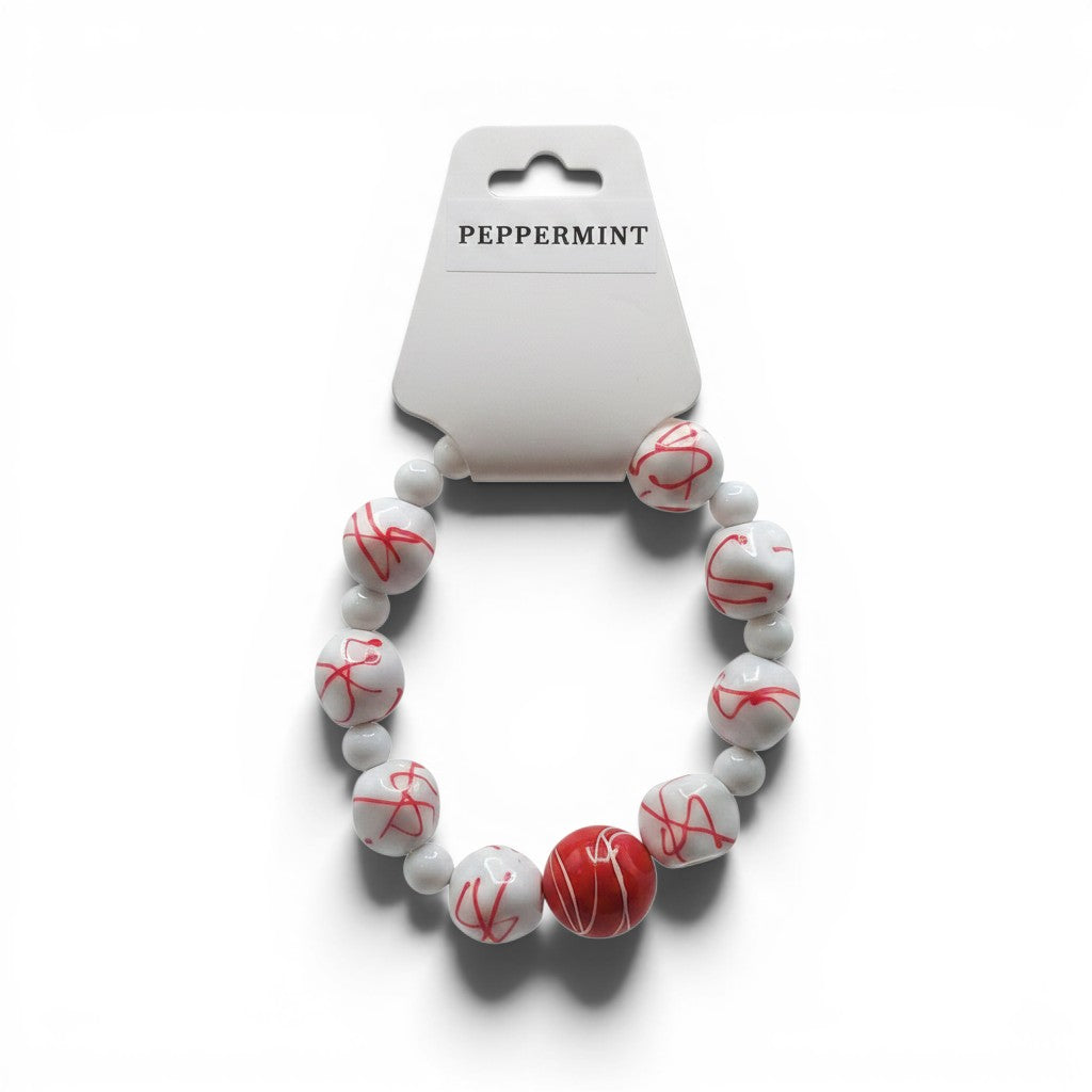 CCBeadsandBeyondLLC peppermint themed bracelet with white and red swirled beads and smaller white beads.