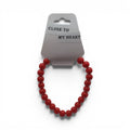 CCBeadsandBeyondLLC red beaded bracelet with "Close To My Heart" tag