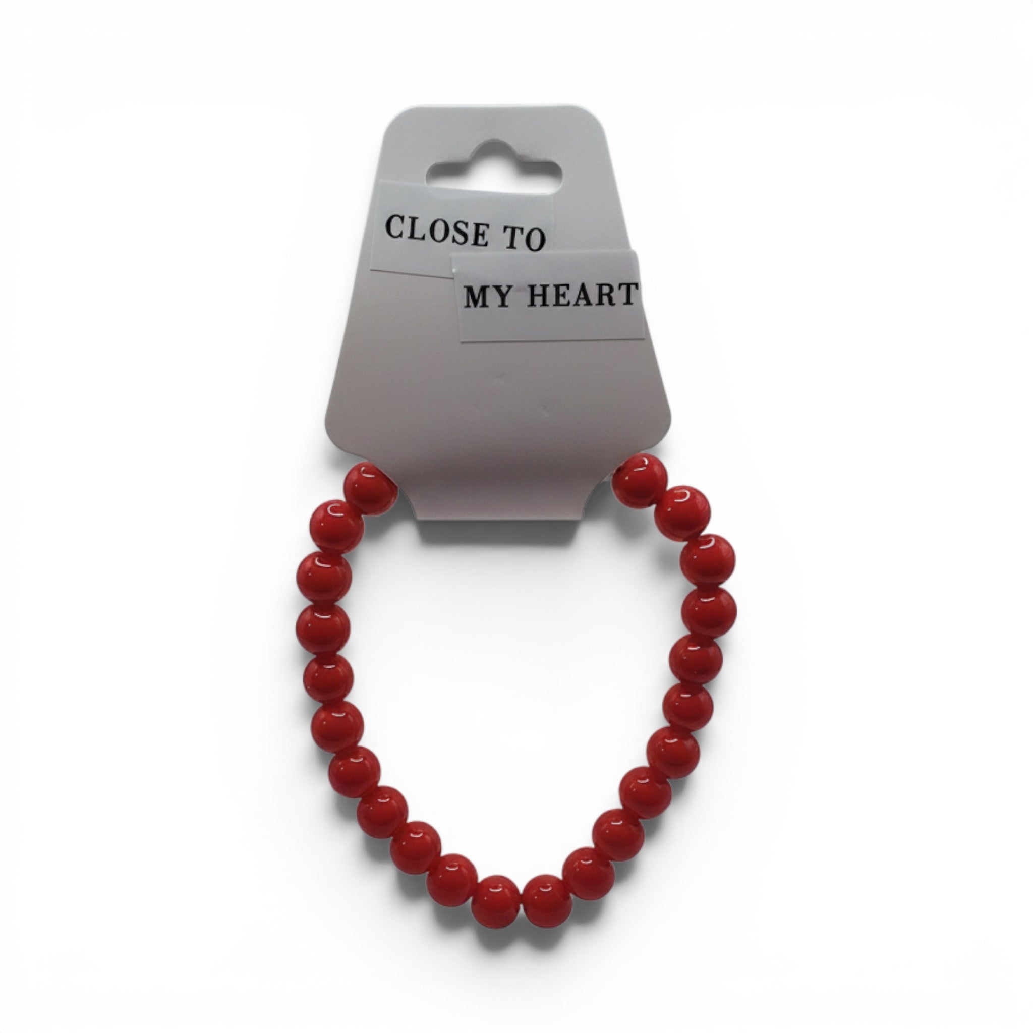 CCBeadsandBeyondLLC red beaded bracelet with "Close To My Heart" tag