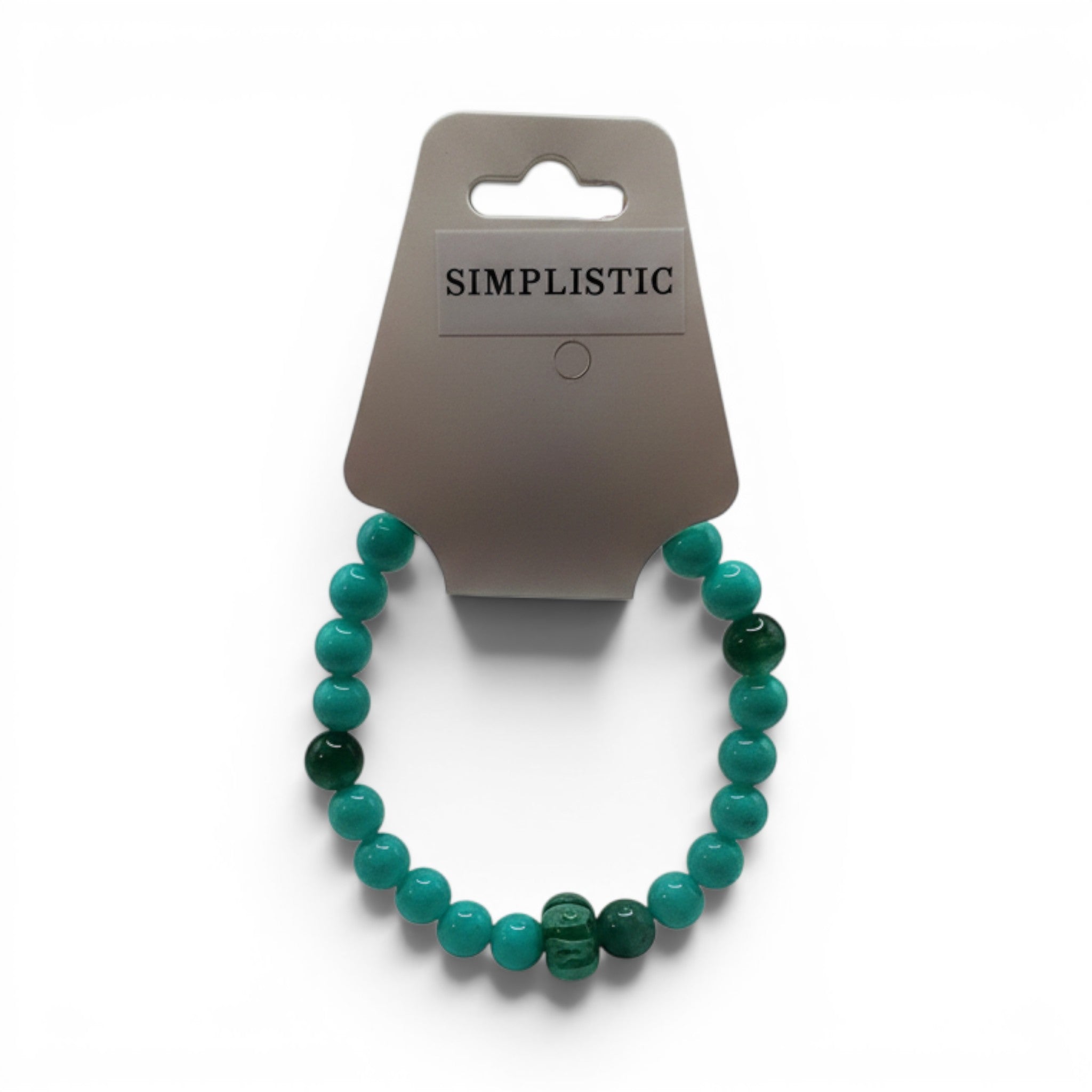 CCBeadsandBeyondLLC Simplistic bracelet with turquoise and green jade beads, featuring a carved green bead accent.
