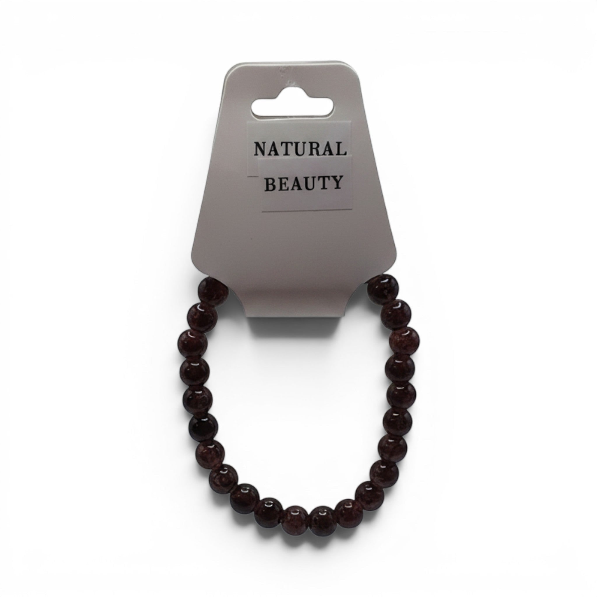 CCBeadsandBeyondLLCHere Natural Beauty bracelet with deep red garnet beads on a white background.